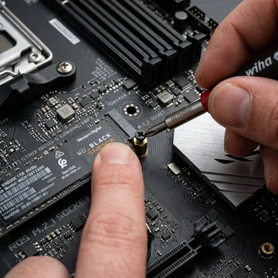 Secure the SSD with the Retention Screw